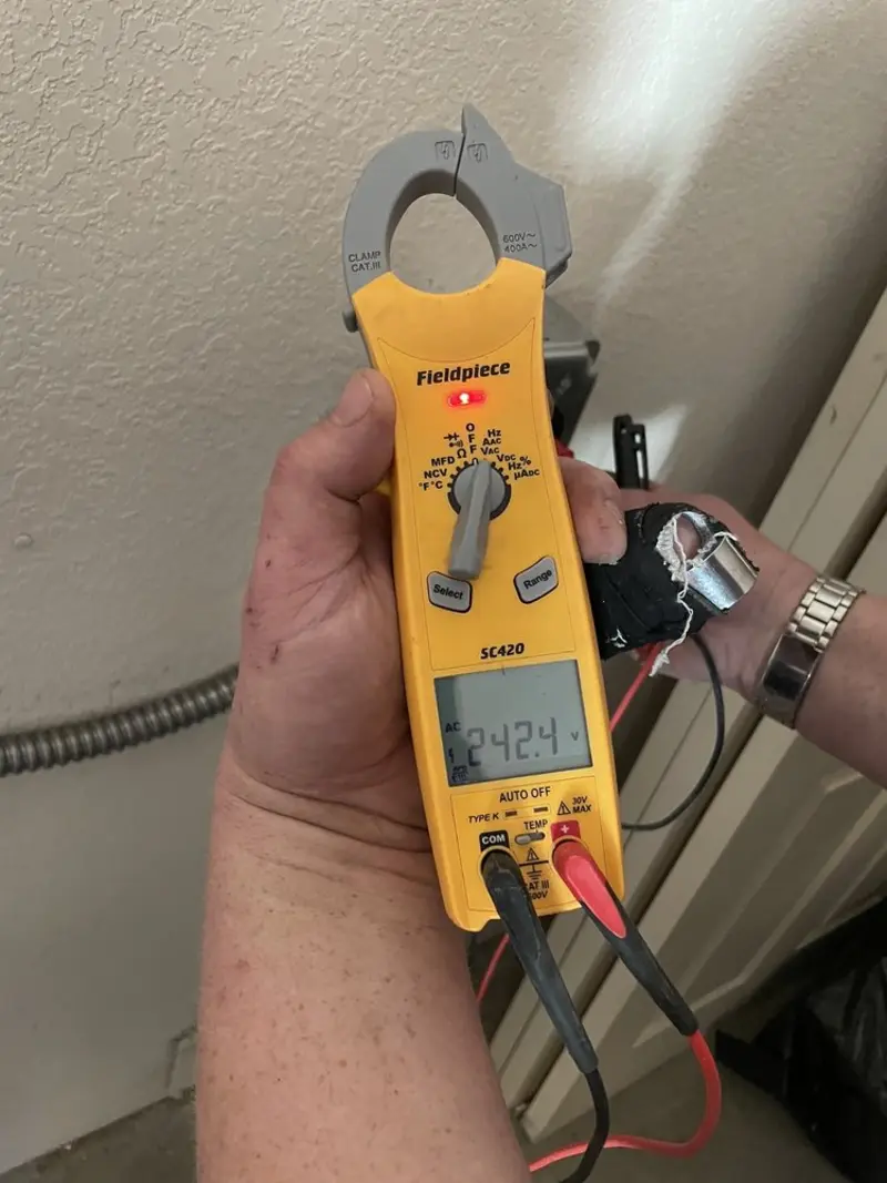 Voltage testing with clamp meter during Aluminum Wiring Replacement in Lawrence